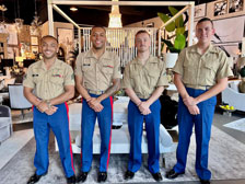 military men standing with arms crossed